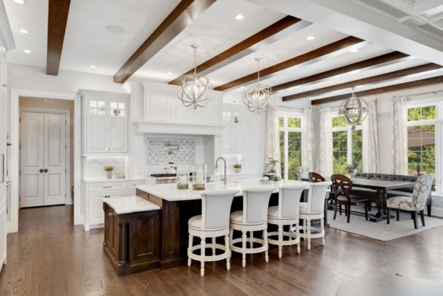 White Cabinets with Rustic Wood Island