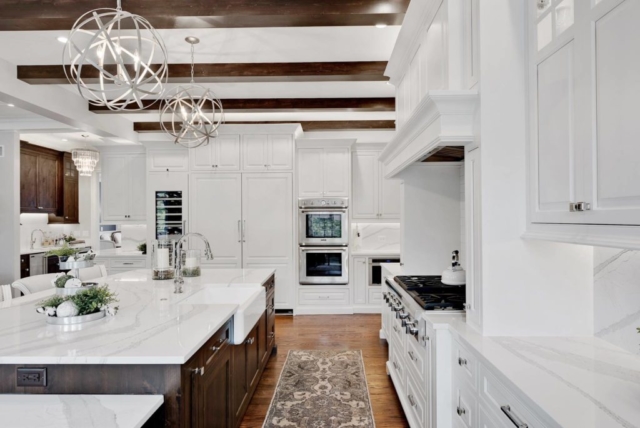 White Cabinets with Rustic Wood Island